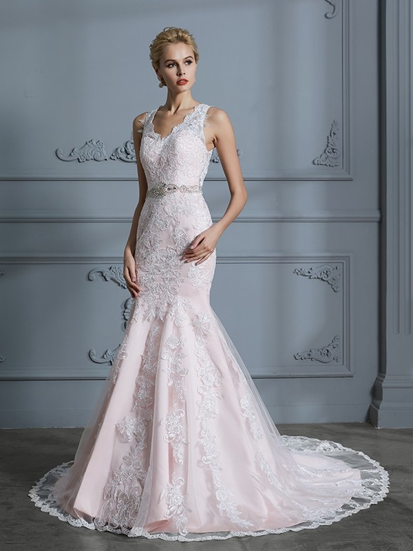Blush pink stiffened trail gown by Bride & Beautiful