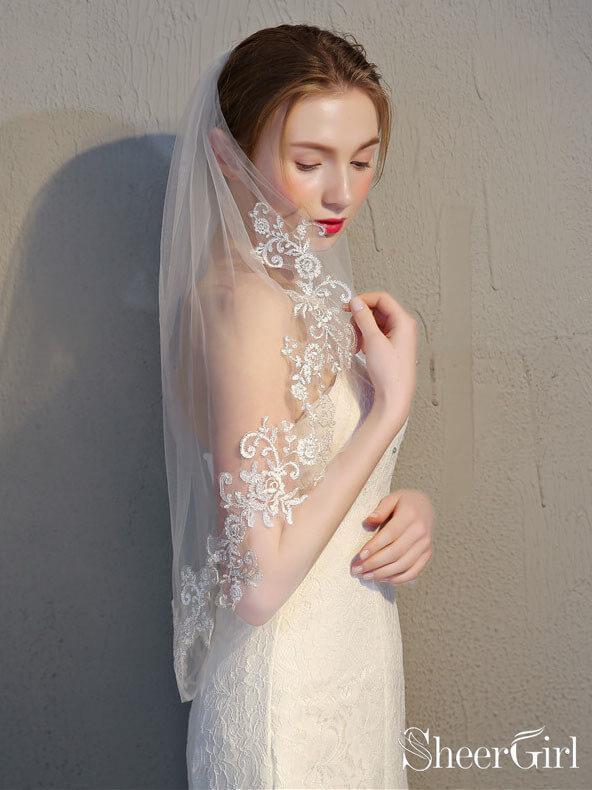 https://www.sheergirl.com/cdn/shop/products/Two-Tier-Ivory-Lace-Short-Bridal-Veils-Mid-Length-Wedding-Veil-ACC1065-3_974989db-7d0b-408e-ab8c-82110f3da8fd_1024x1024.jpg?v=1631817020