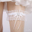 Bílé krajkové svatební podvazky s mašlí ACC1015